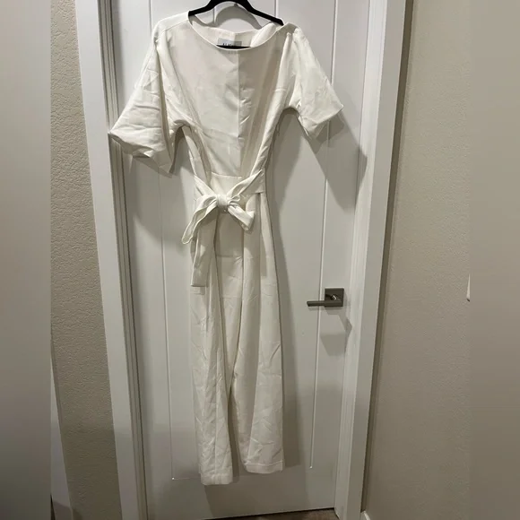 Ana Off-Shoulder Belted Jumpsuit in White - Picture 7 of 15